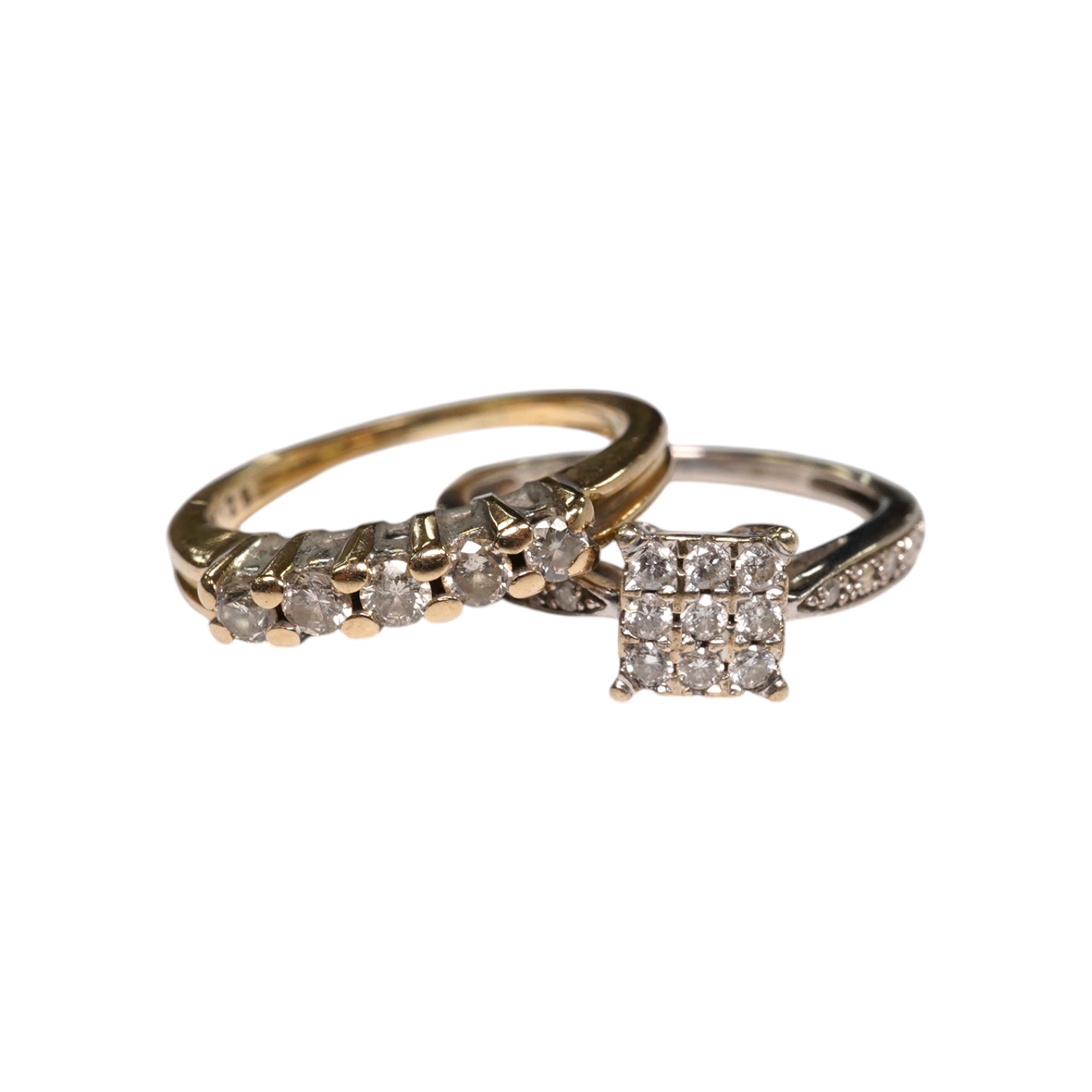 Two modern 9ct gold and diamond set rings, including square cluster and five stone half hoop, gross weight 4.2 grams.